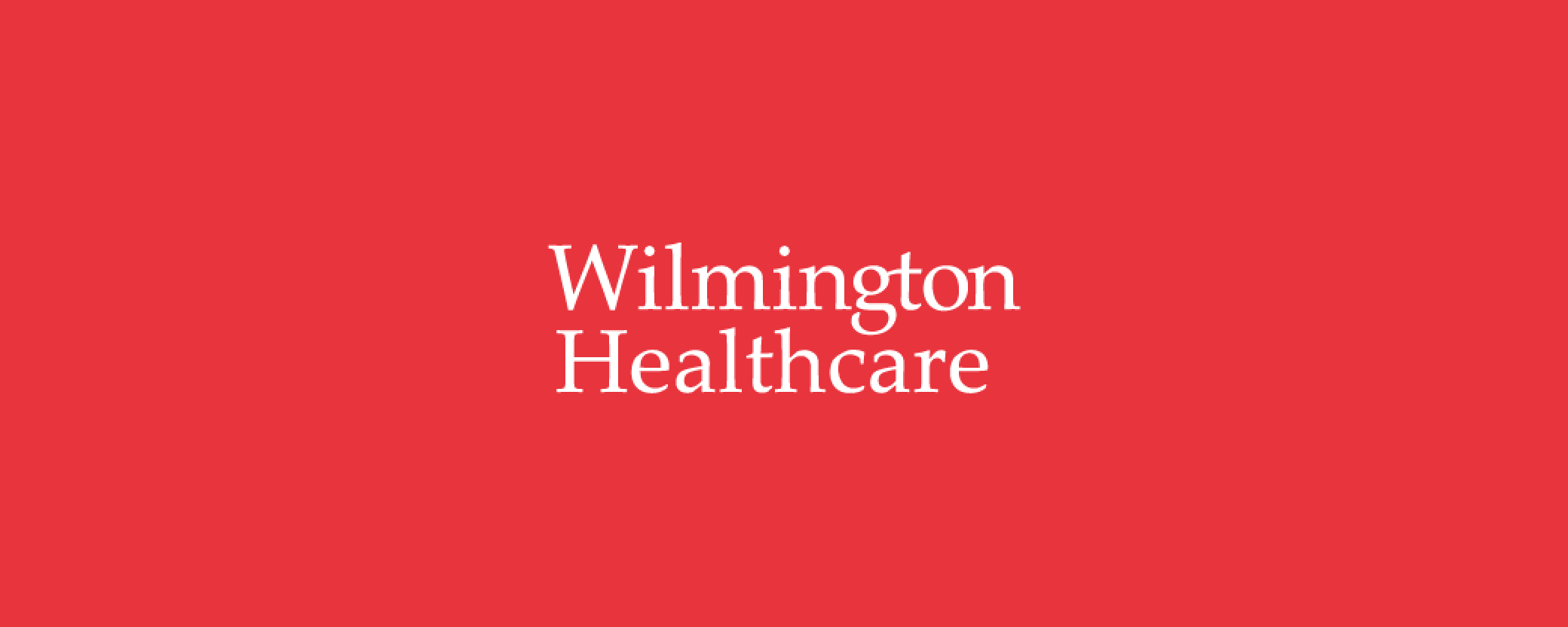 White Wilmington logo on a red background 