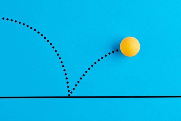 yellow bouncing ball against a blue background